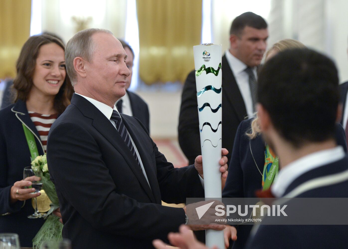 President Vladimir Putin gives government awards to Olympic medalists