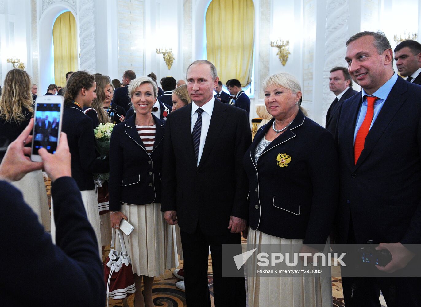 President Vladimir Putin gives government awards to Olympic medalists