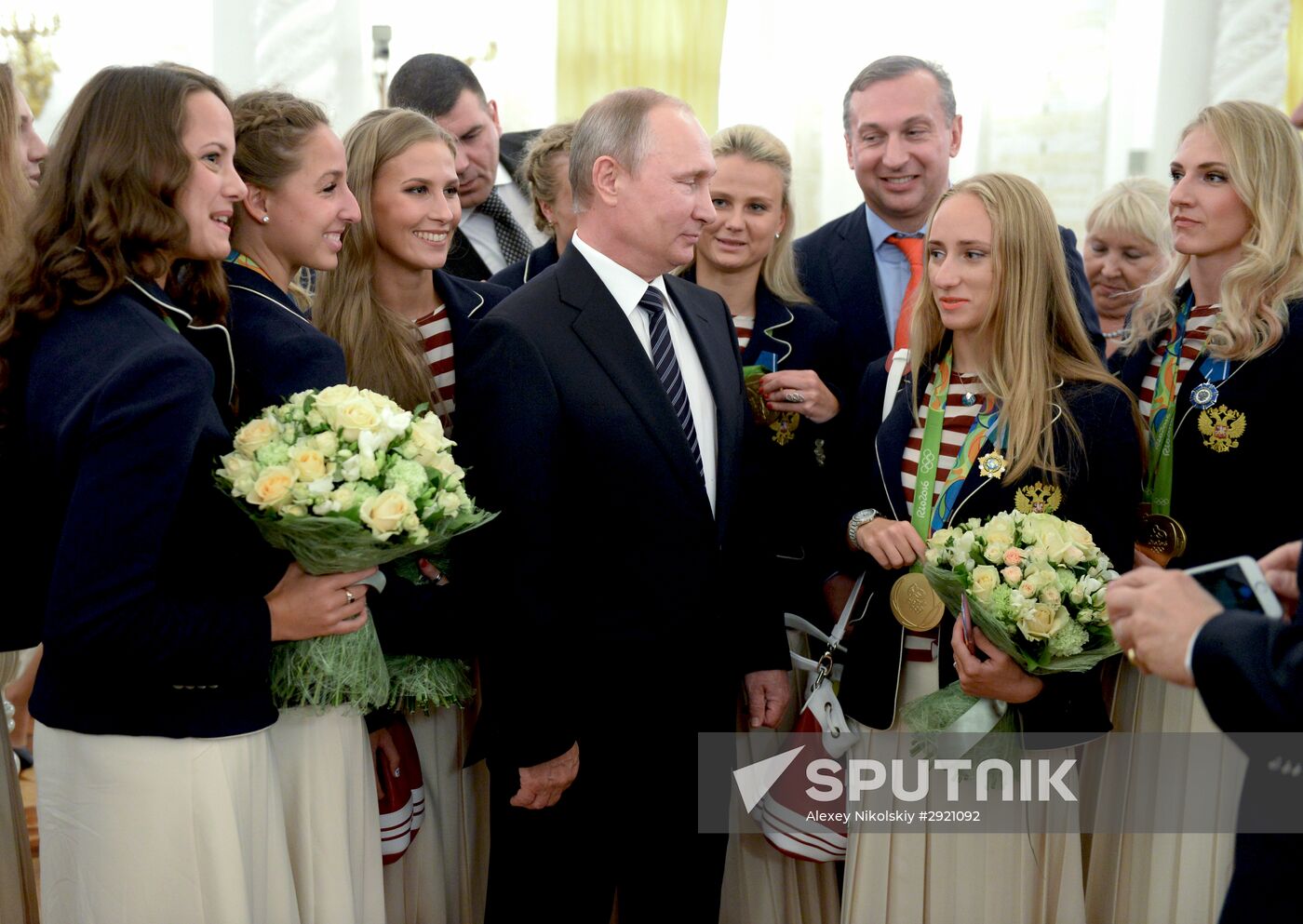 President Vladimir Putin gives government awards to Olympic medalists