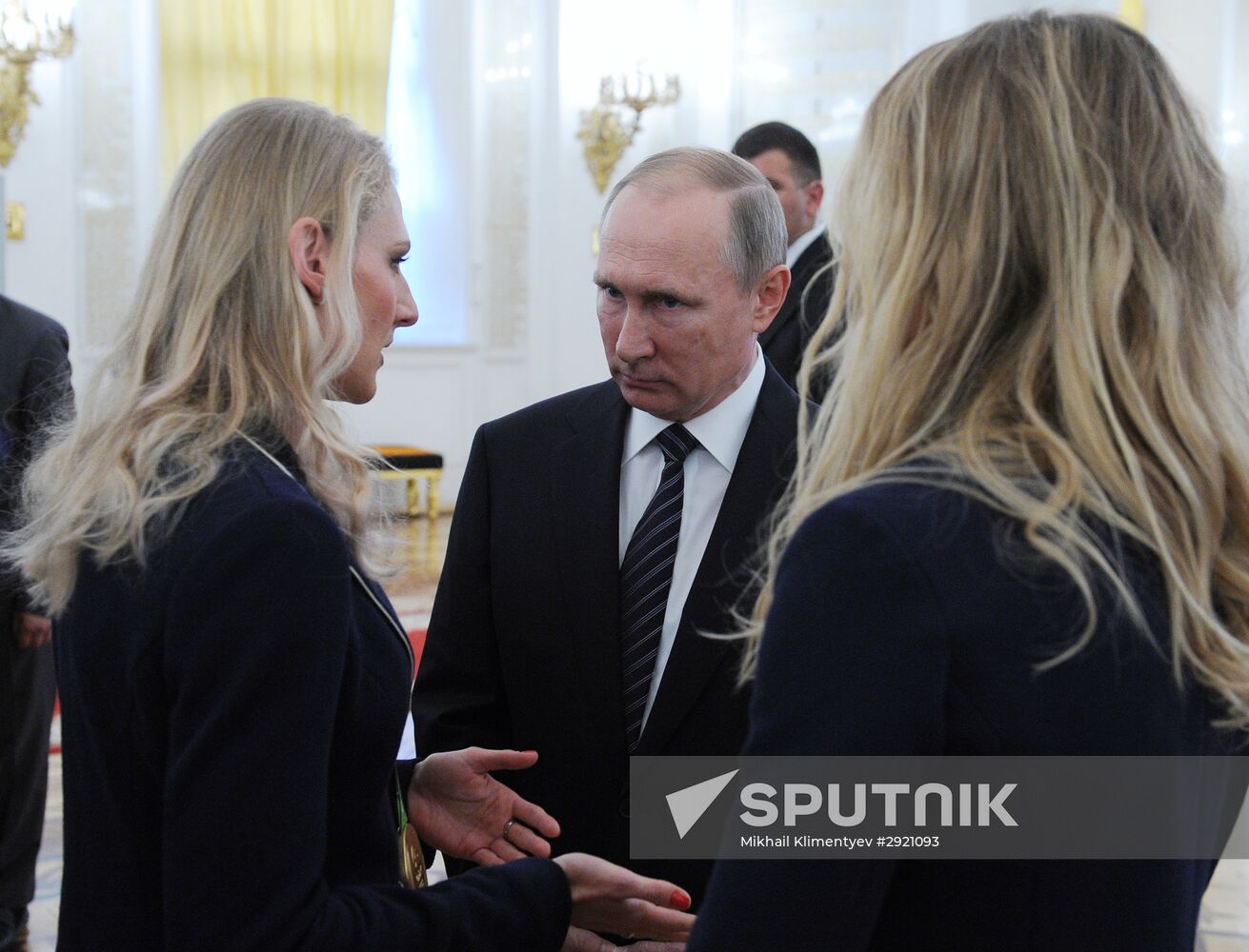President Vladimir Putin gives government awards to Olympic medalists
