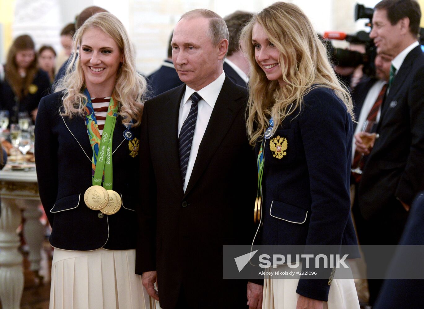 President Vladimir Putin gives government awards to Olympic medalists