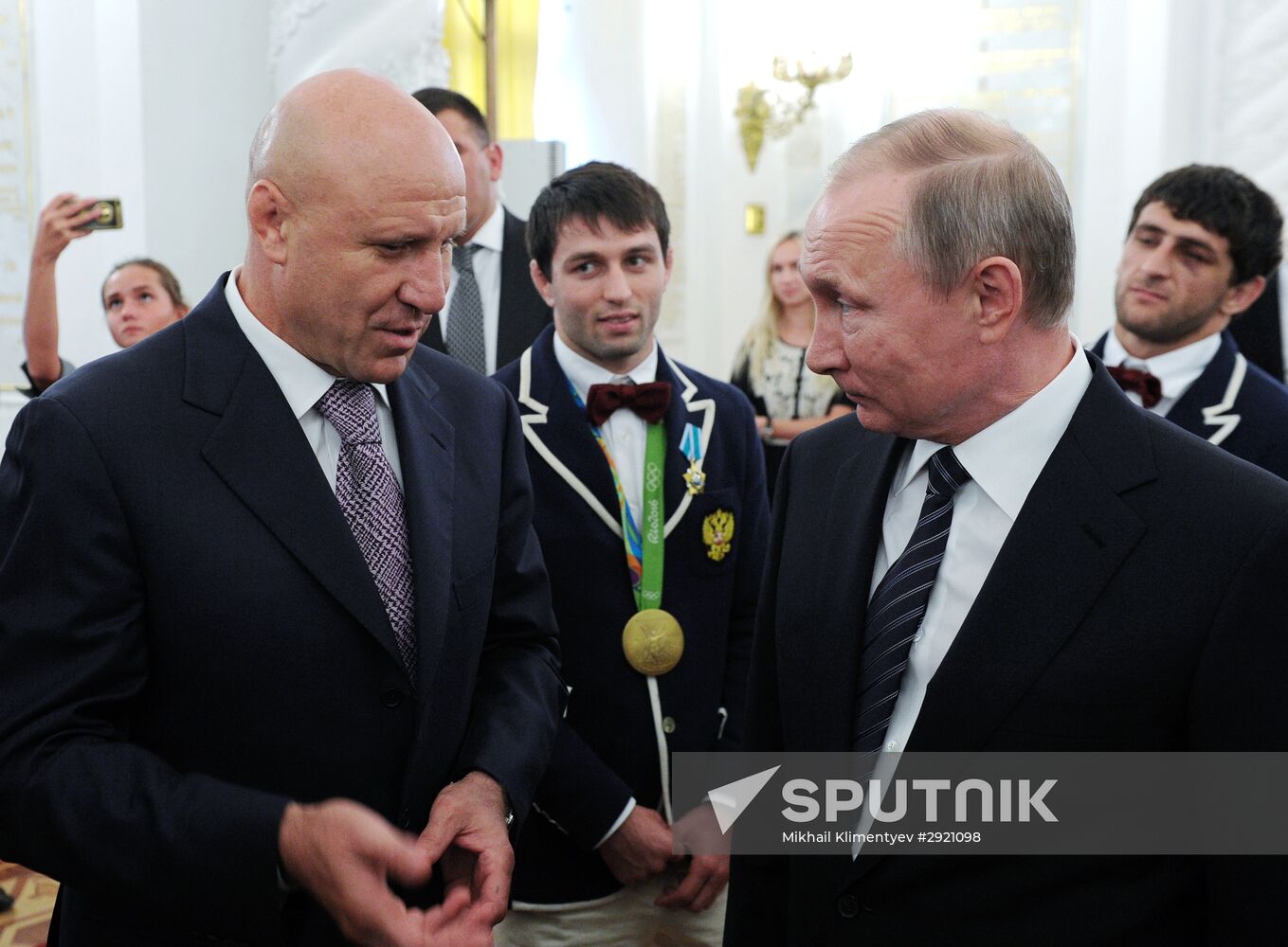 President Vladimir Putin gives government awards to Olympic medalists