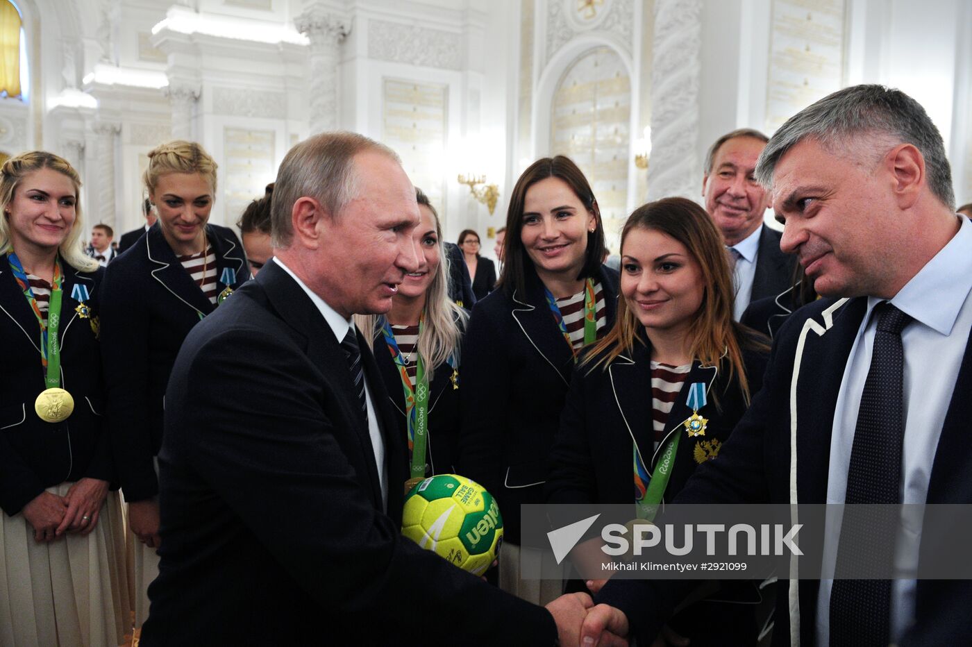 President Vladimir Putin gives government awards to Olympic medalists
