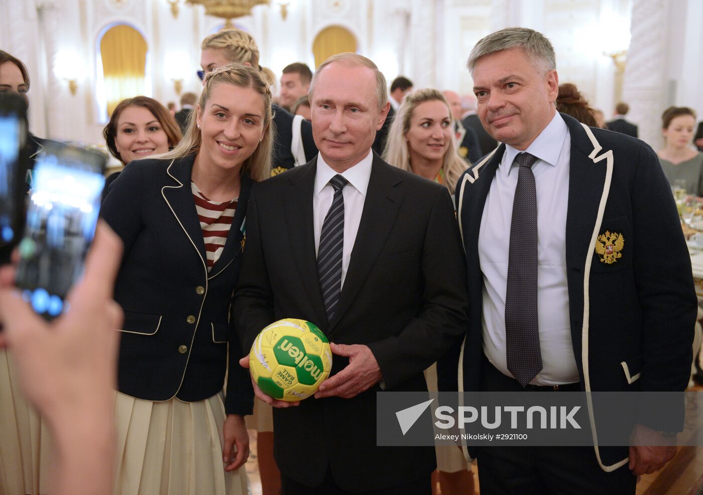 President Vladimir Putin gives government awards to Olympic medalists