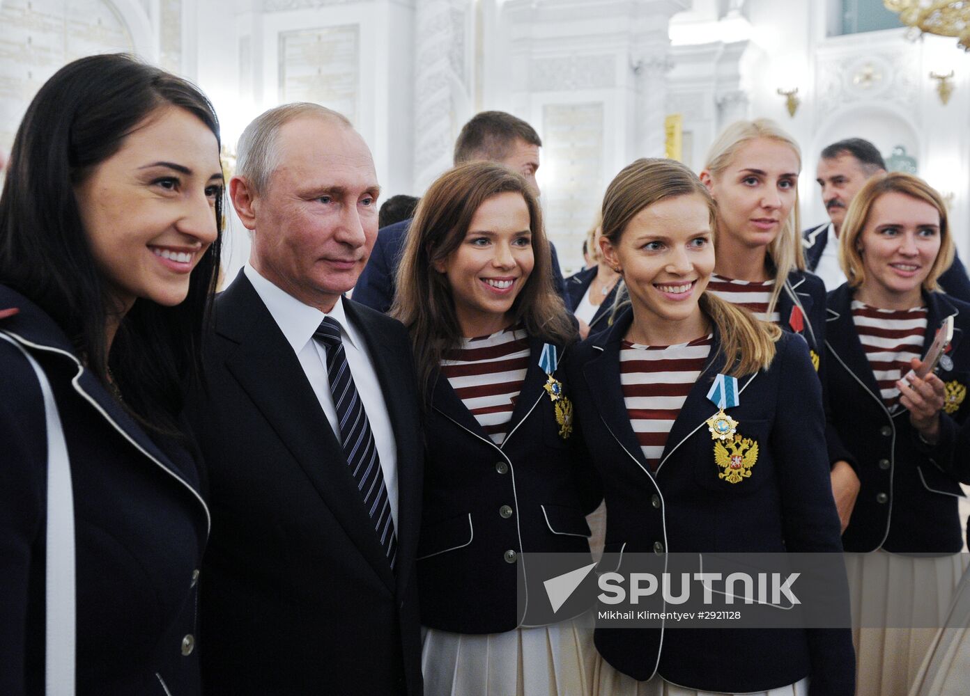 President Vladimir Putin gives government awards to Olympic medalists