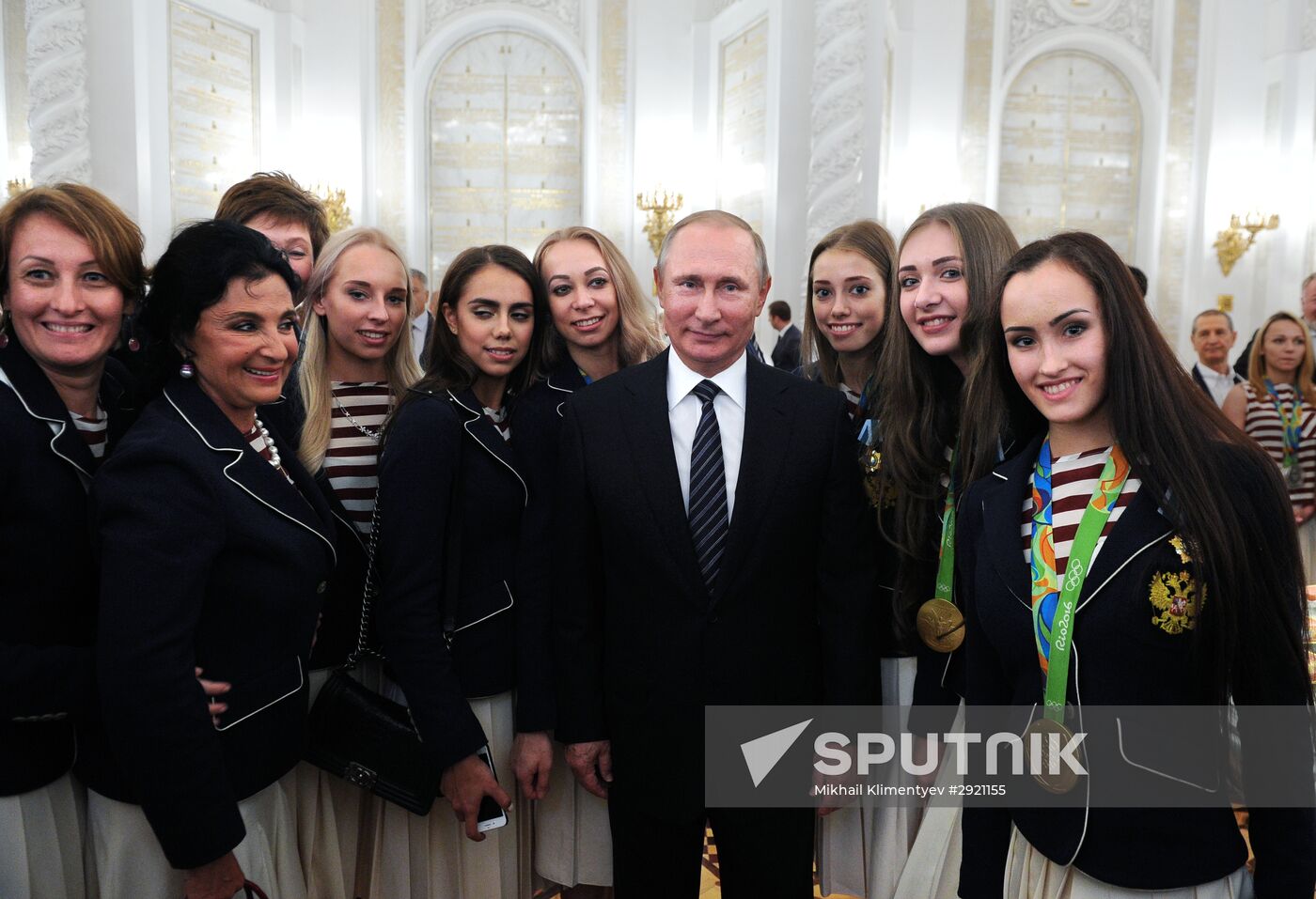 President Vladimir Putin gives government awards to Olympic medalists