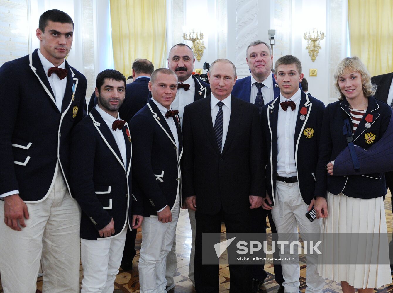 President Vladimir Putin gives government awards to Olympic medalists