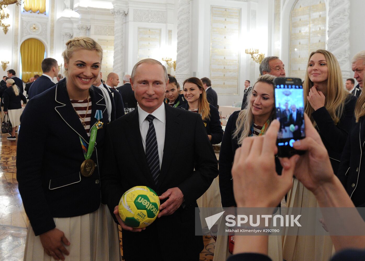 President Vladimir Putin gives government awards to Olympic medalists