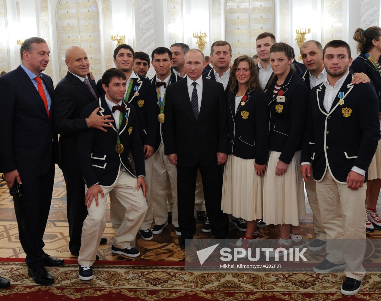 President Vladimir Putin gives government awards to Olympic medalists