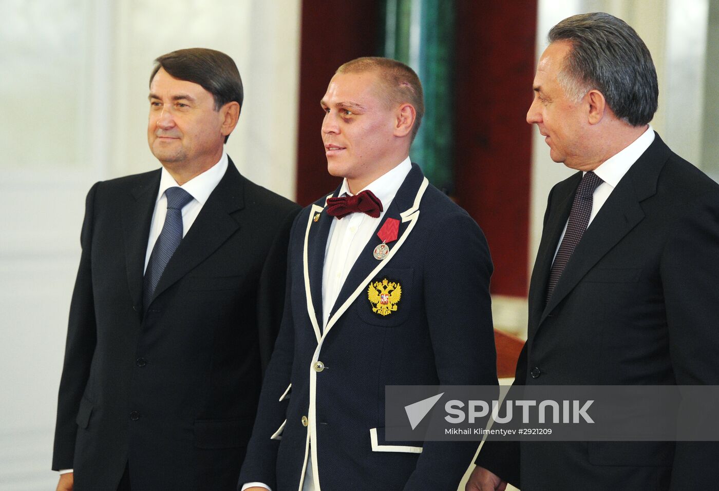 President Vladimir Putin gives government awards to Olympic medalists