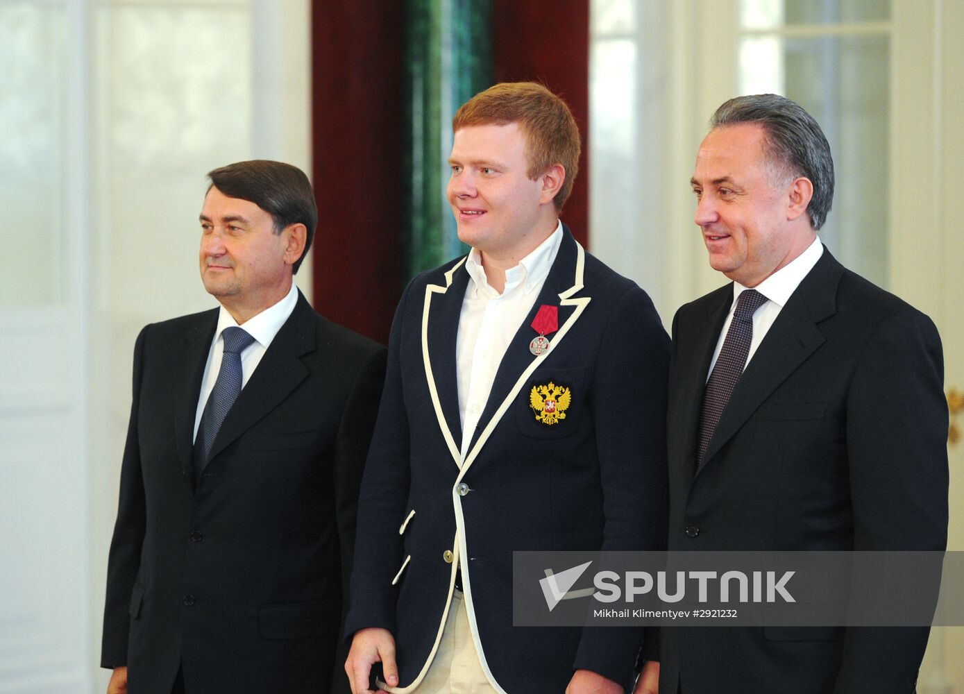 President Vladimir Putin gives government awards to Olympic medalists