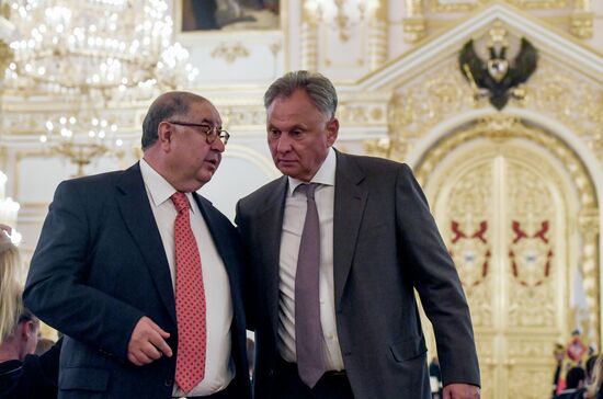 President Vladimir Putin gives government awards to Olympic medalists