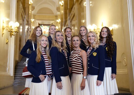 President Vladimir Putin gives government awards to Olympic medalists