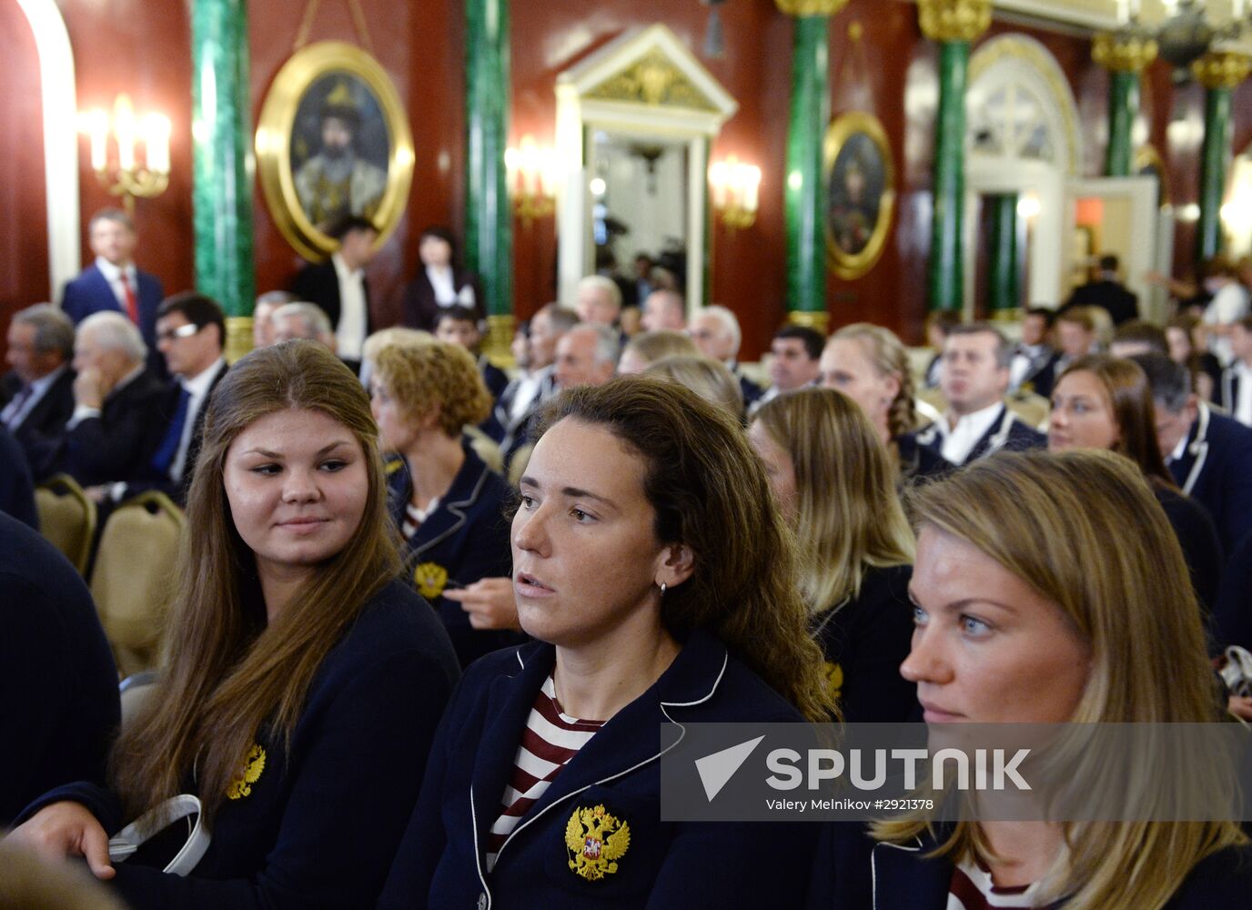 President Vladimir Putin gives government awards to Olympic medalists