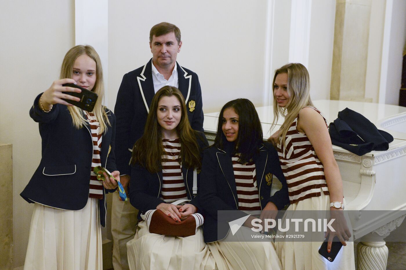 President Vladimir Putin gives government awards to Olympic medalists