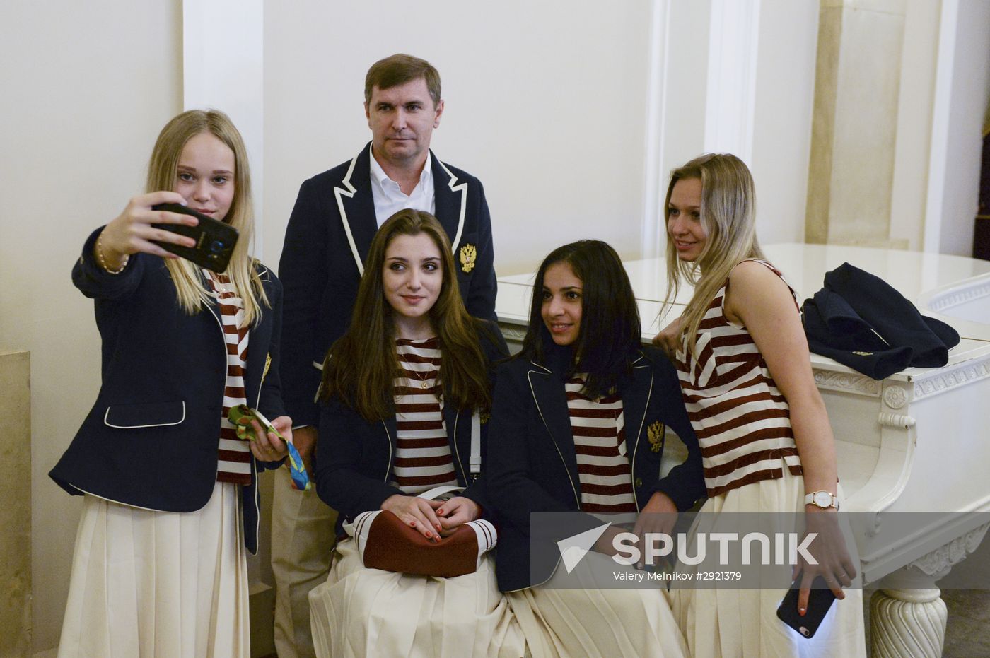 President Vladimir Putin gives government awards to Olympic medalists