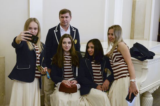 President Vladimir Putin gives government awards to Olympic medalists