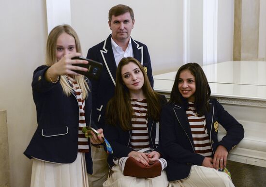 President Vladimir Putin gives government awards to Olympic medalists