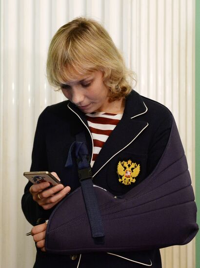 President Vladimir Putin gives government awards to Olympic medalists