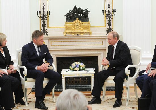 Russian President Vladimir Putin meets with Slovak Prime Minister Robert Fico