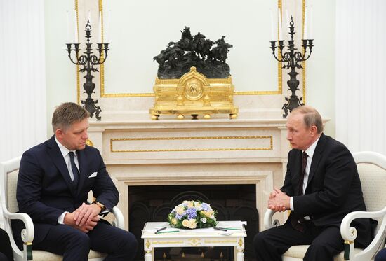 Russian President Vladimir Putin meets with Slovak Prime Minister Robert Fico