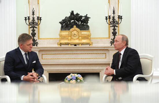 Russian President Vladimir Putin meets with Slovak Prime Minister Robert Fico