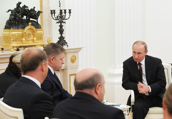 Russian President Vladimir Putin meets with Slovak Prime Minister Robert Fico