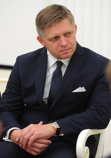 Russian President Vladimir Putin meets with Slovak Prime Minister Robert Fico