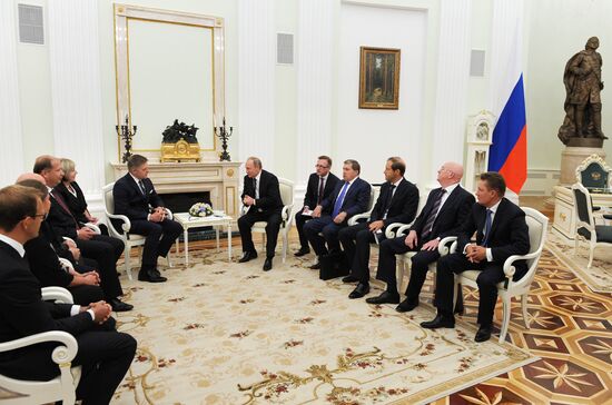 Russian President Vladimir Putin meets with Slovak Prime Minister Robert Fico