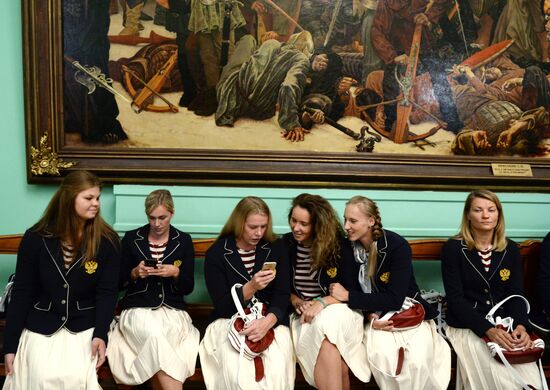 President Vladimir Putin gives government awards to Olympic medalists