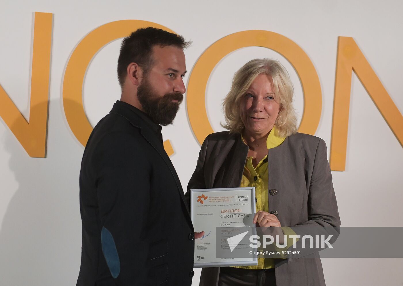 Exhibition of photos by Andrei Stenin International Press Photo Contest winners opens in Moscow