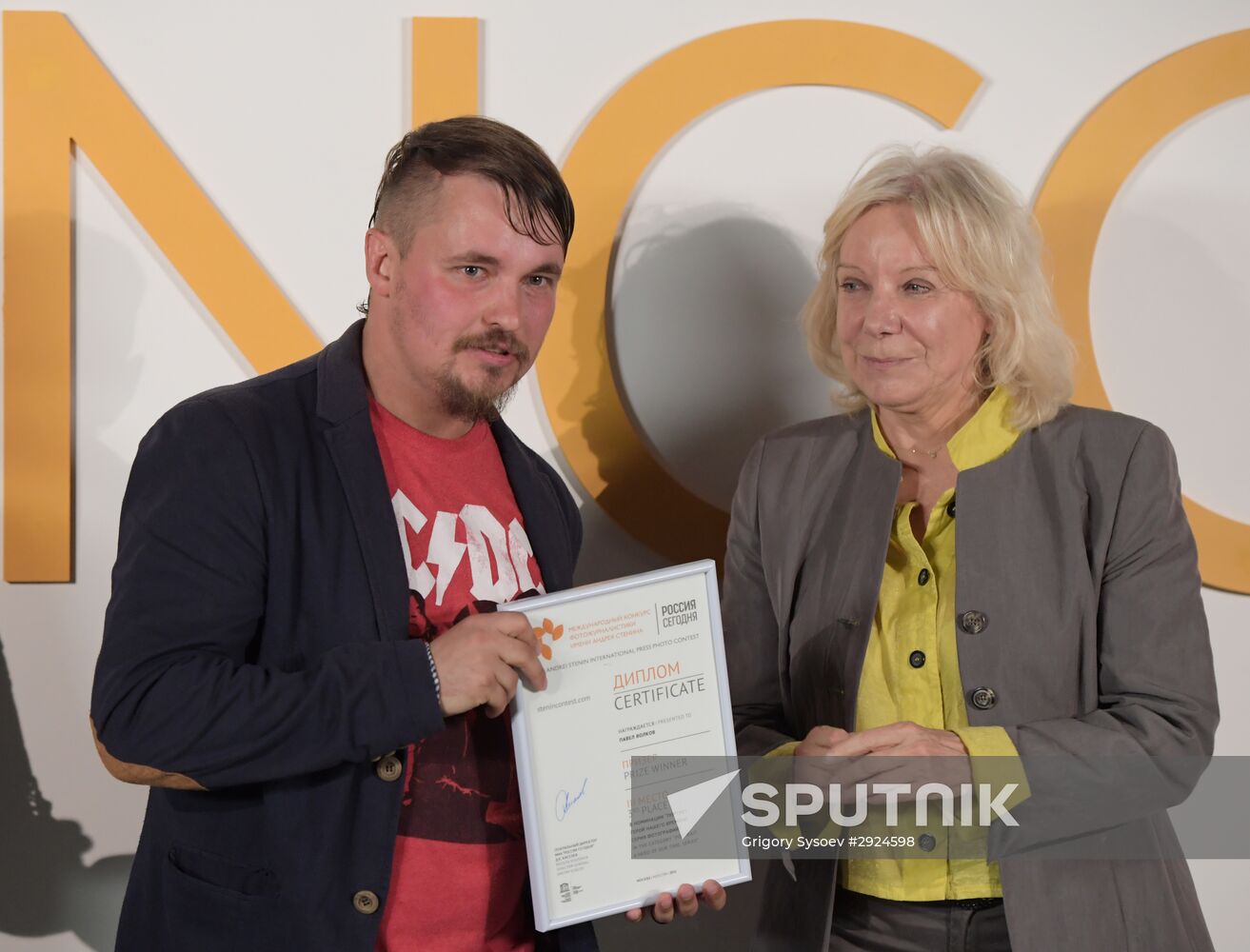 Exhibition of photos by Andrei Stenin International Press Photo Contest winners opens in Moscow