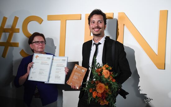 Exhibition of photos by Andrei Stenin International Press Photo Contest winners opens in Moscow