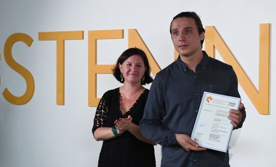 Exhibition of photos by Andrei Stenin International Press Photo Contest winners opens in Moscow