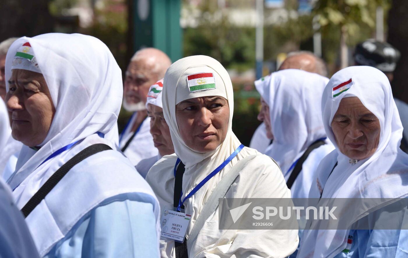 Tajik pilgrims in Dushanbe airport heading to Hajj