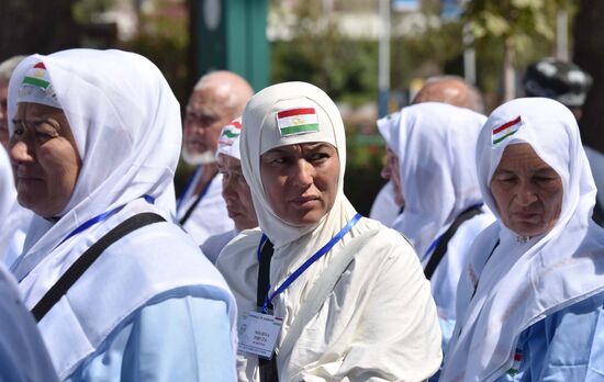 Tajik pilgrims in Dushanbe airport heading to Hajj