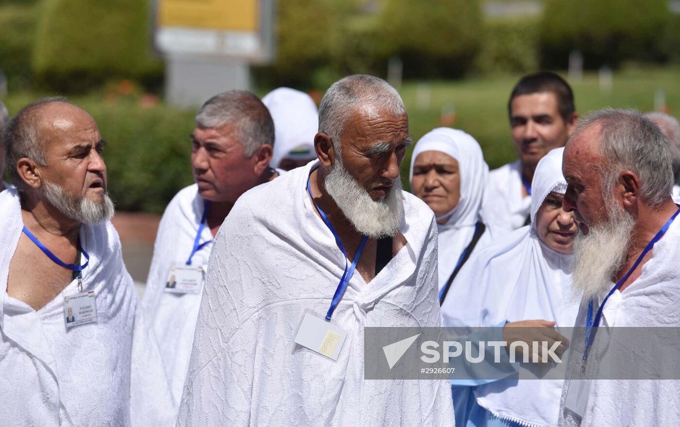 Tajik pilgrims in Dushanbe airport heading to Hajj