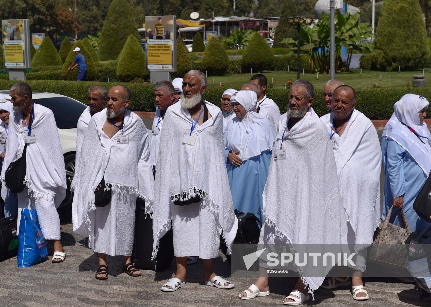 Tajik pilgrims in Dushanbe airport heading to Hajj