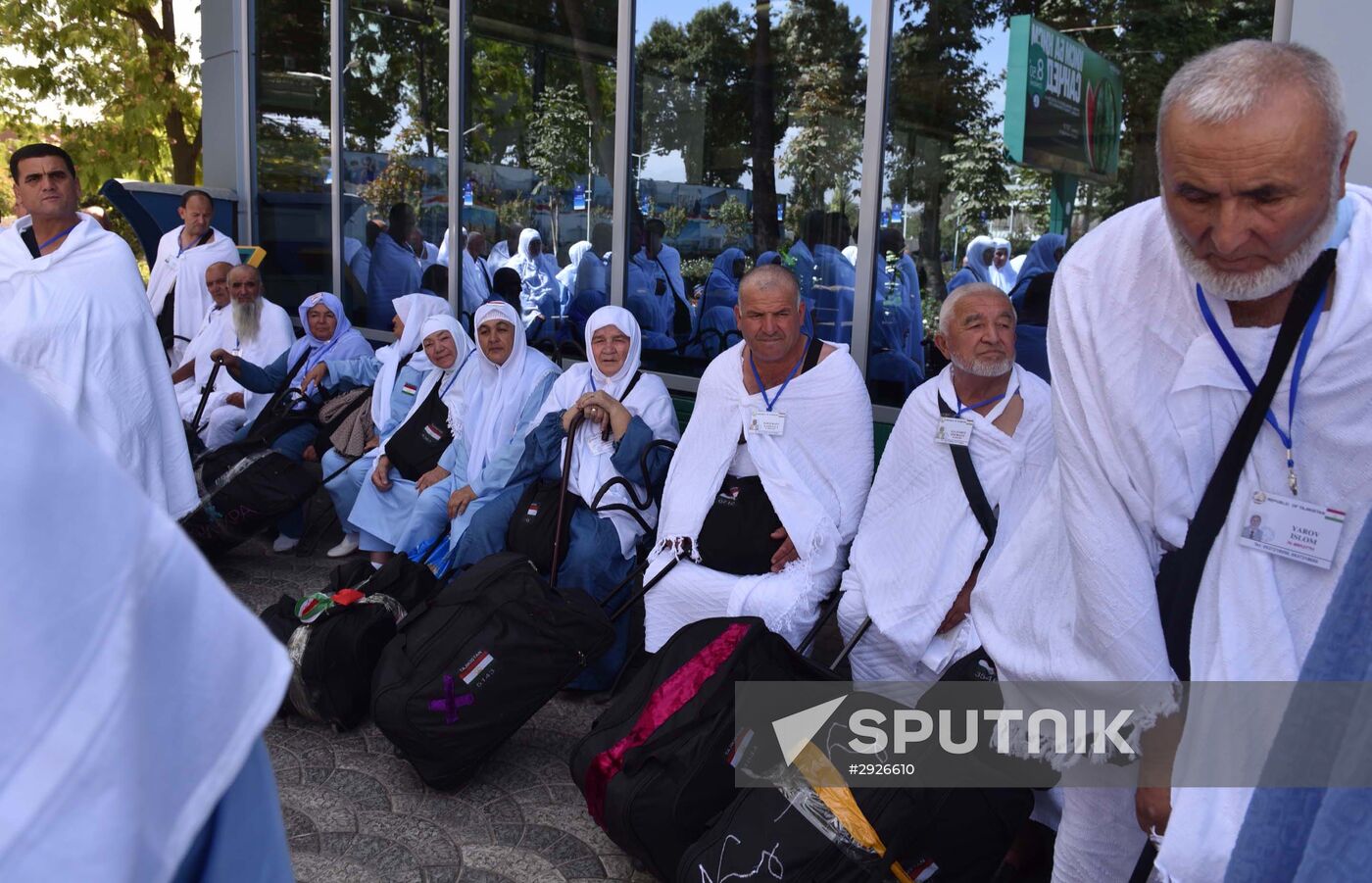 Tajik pilgrims in Dushanbe airport heading to Hajj