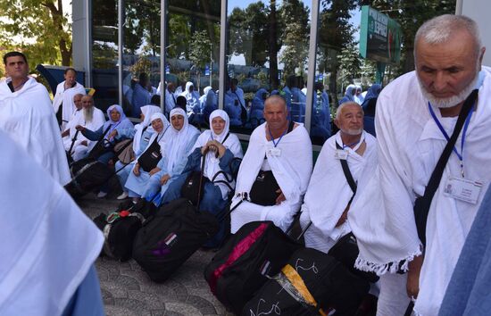 Tajik pilgrims in Dushanbe airport heading to Hajj