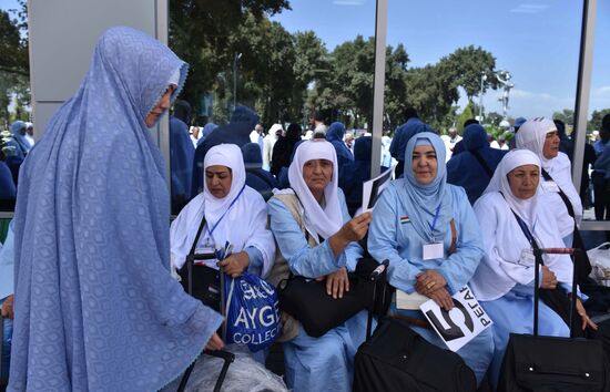 Tajik pilgrims in Dushanbe airport heading to Hajj