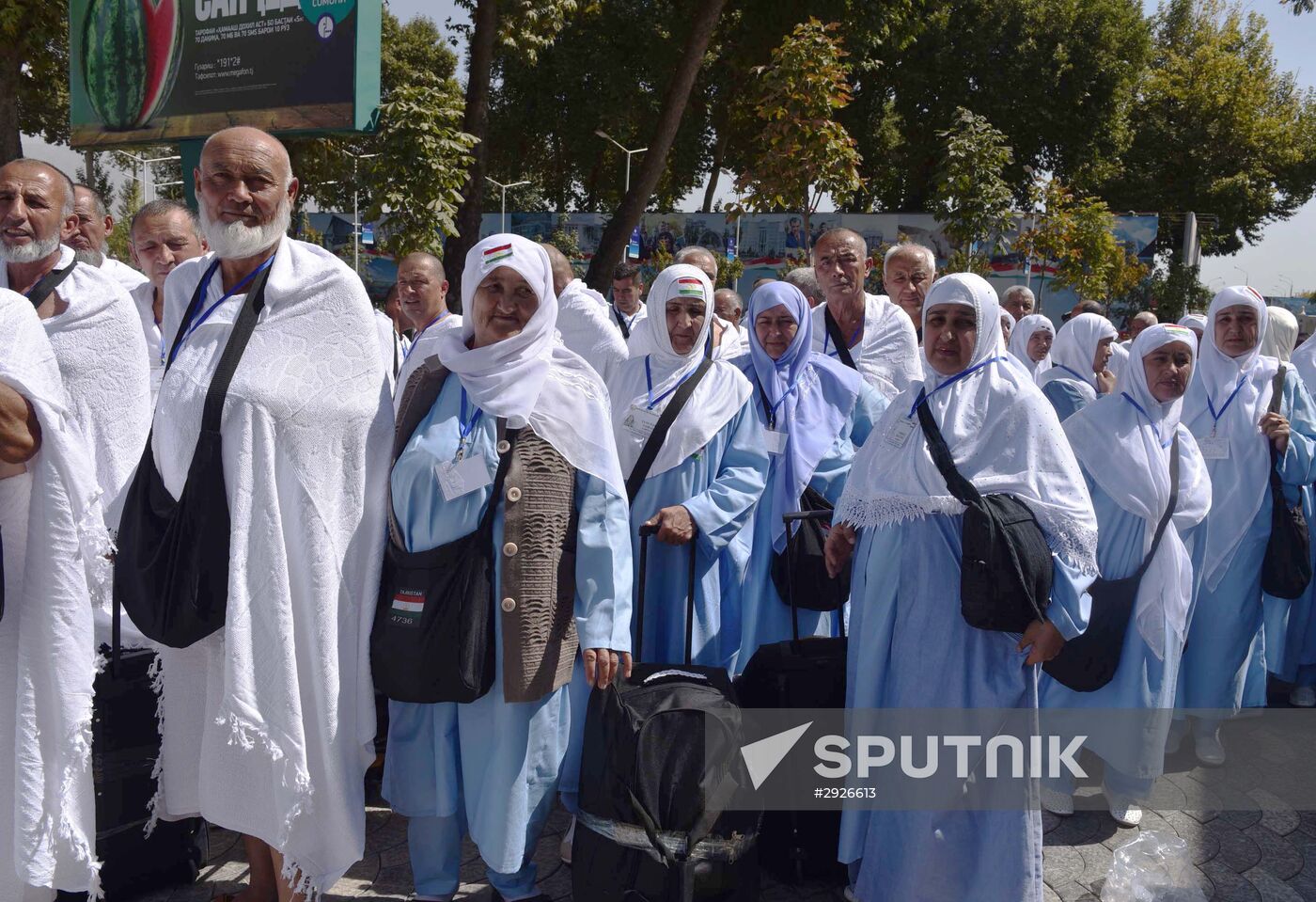 Tajik pilgrims in Dushanbe airport heading to Hajj