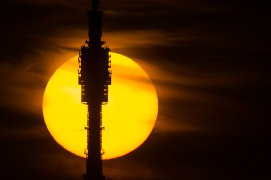 Ostankino TV tower seen against sunset