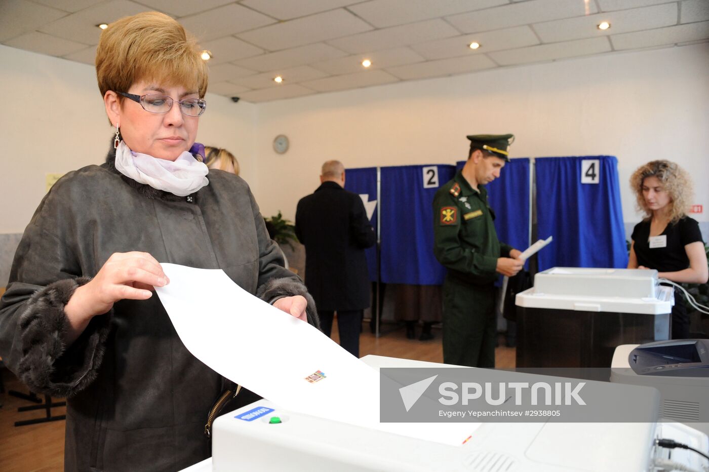 Public and political leaders vote on general election day