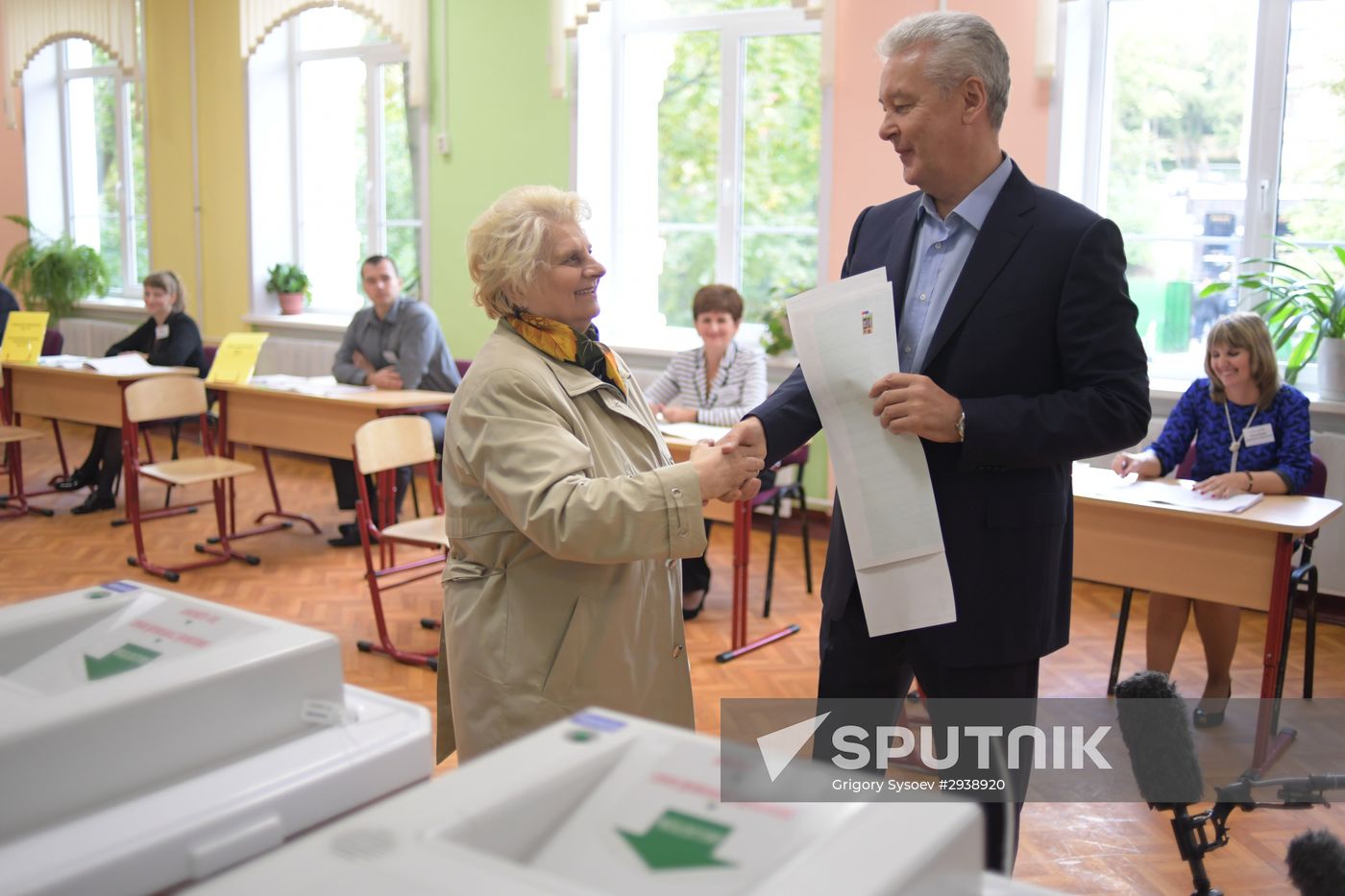 Public and political leaders vote on general election day