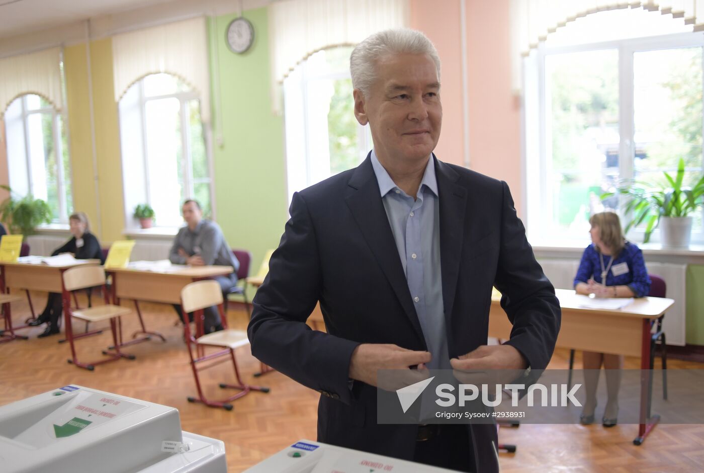 Public and political leaders vote on general election day