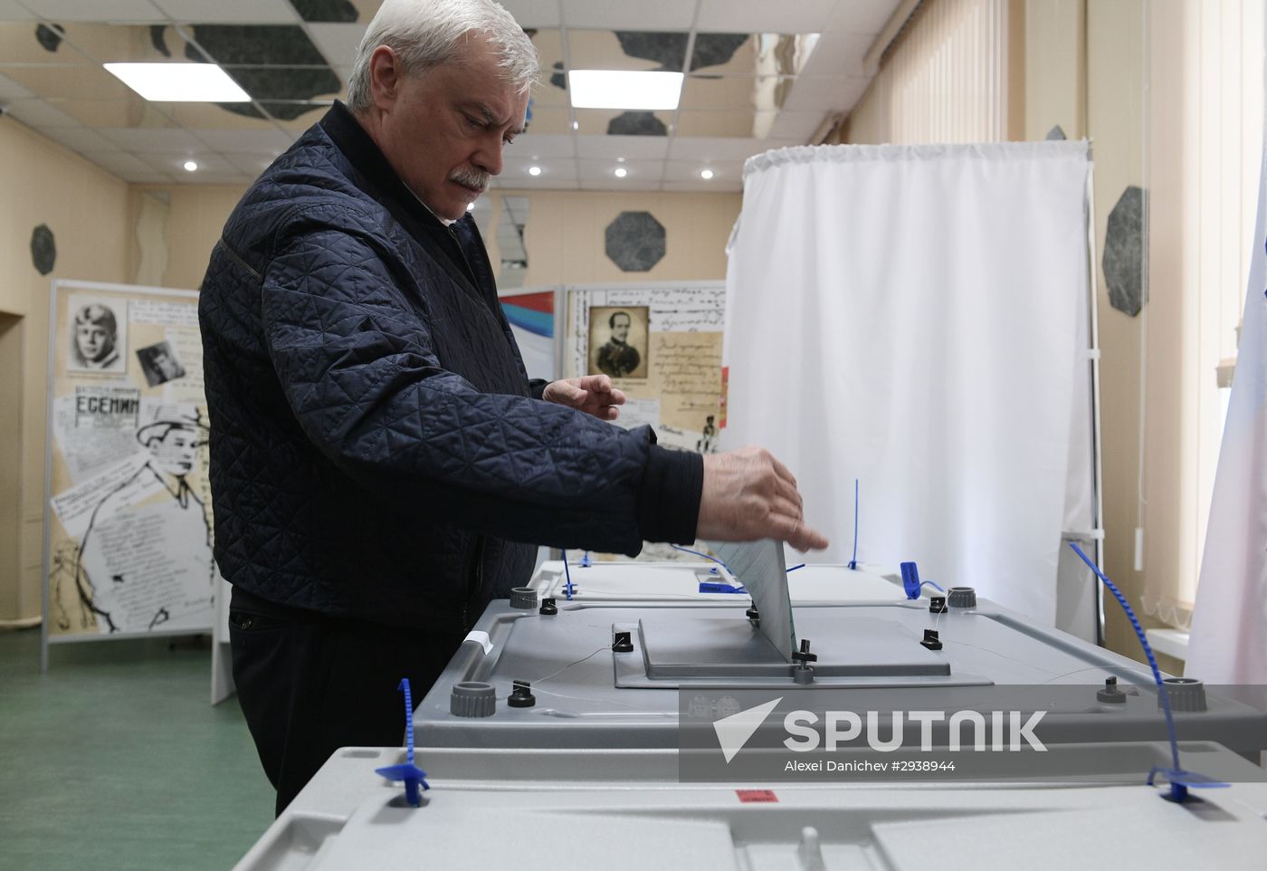 Public and political leaders vote on general election day