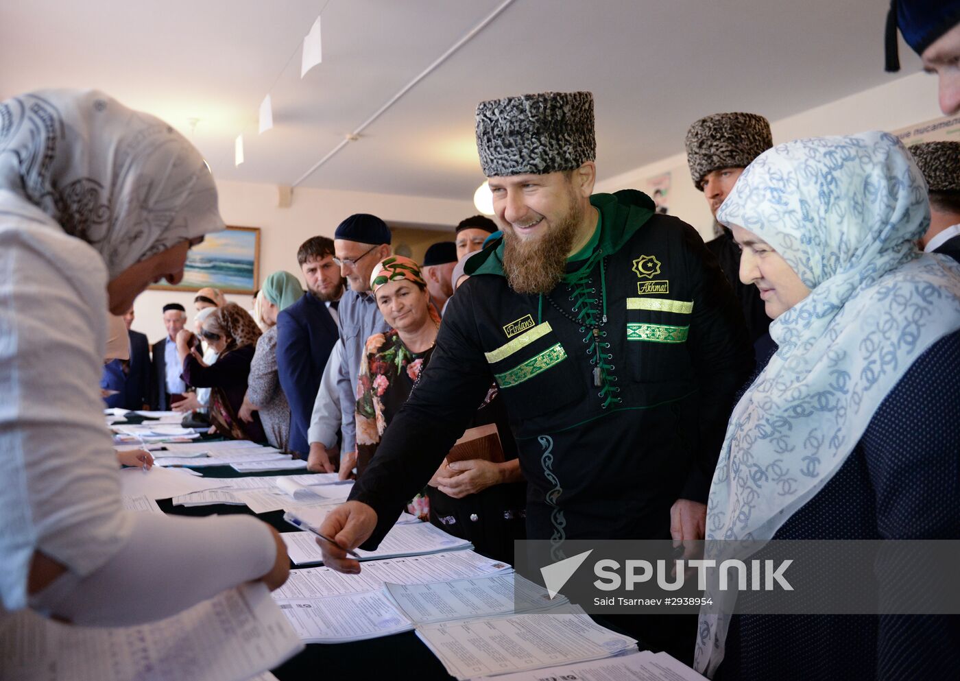 Public and political leaders vote on general election day
