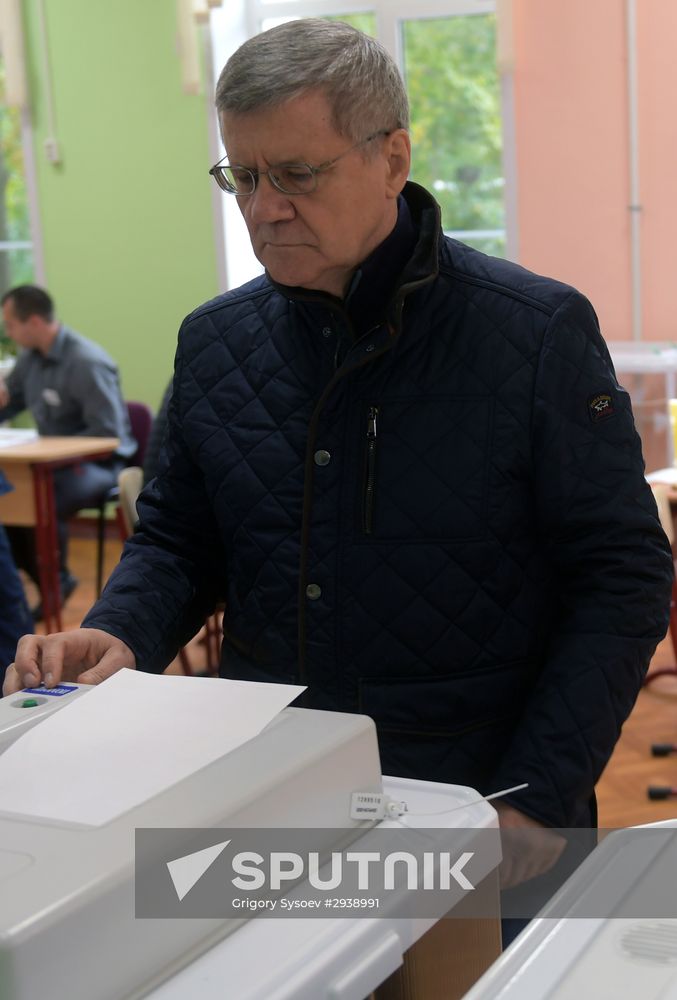 Public and political leaders vote on general election day