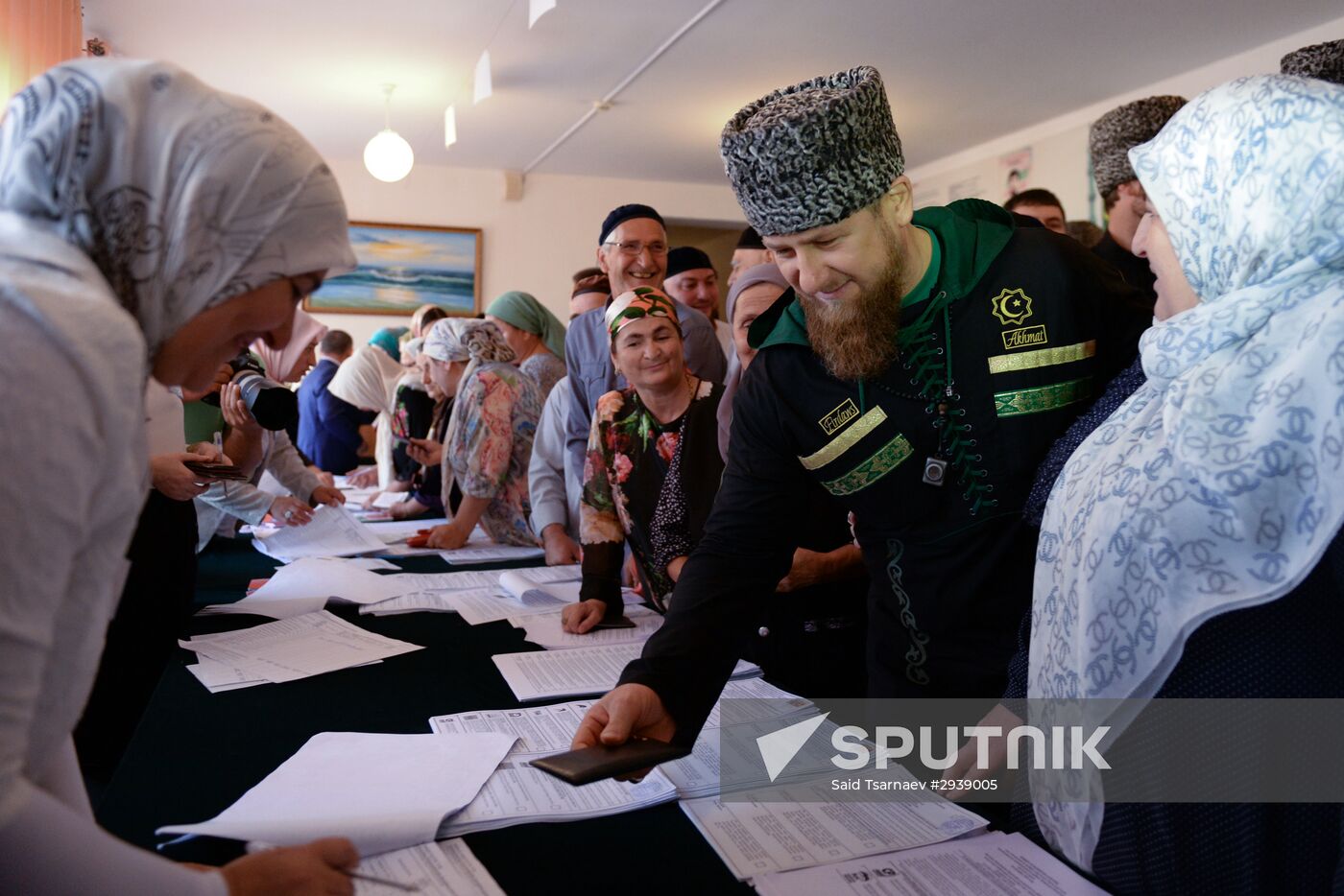 Public and political leaders vote on general election day